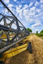 View along a mowing machine standing on a harvested field in the surrounding countryside of Ã¢â¬â¹Ã¢â¬â¹Berlin, Germany Royalty Free Stock Photo